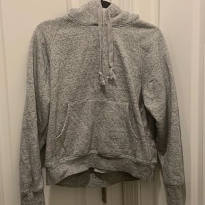 Gray hoodie from Old Navy cuffs have thumb holes and hood is lined.